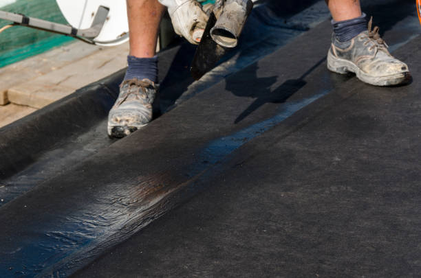 istock laying of waterproofing sheathing  and insulation on a roof 945517846