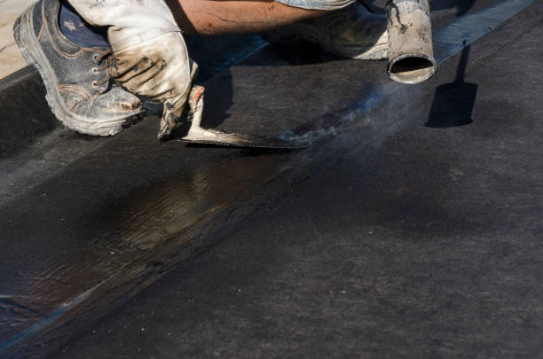 istock laying of waterproofing sheathing  and insulation on a roof 945517888