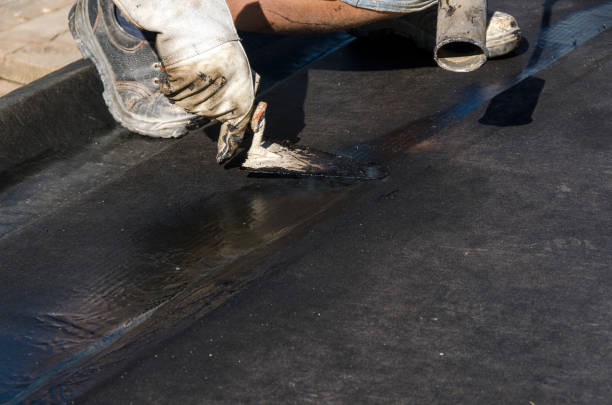 istock laying of waterproofing sheathing  and insulation on a roof 945517890