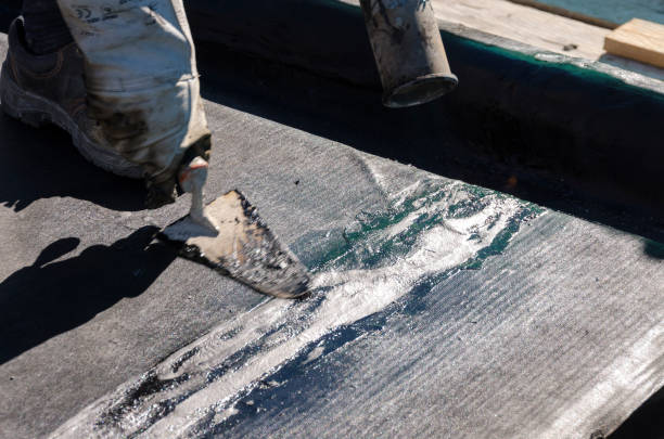 istock laying of waterproofing sheathing  and insulation on a roof 945519952