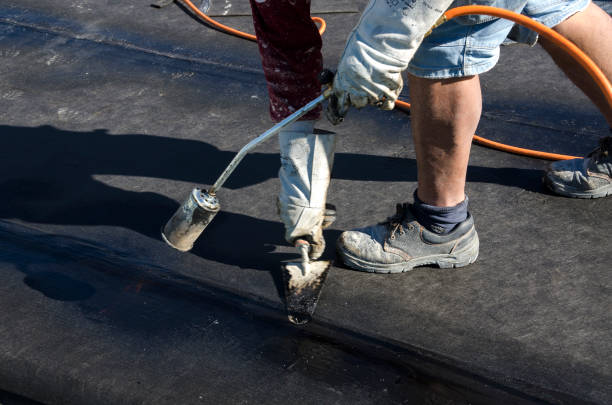 istock laying of waterproofing sheathing  and insulation on a roof 945519992