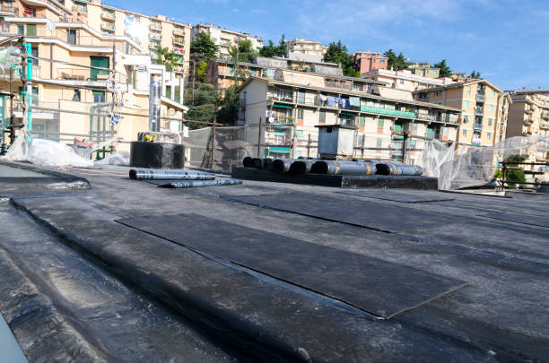 istock laying of waterproofing sheathing  and insulation on a roof 945520026