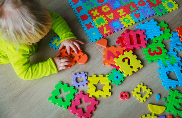 istock little baby girl learning numbers and math 945524972