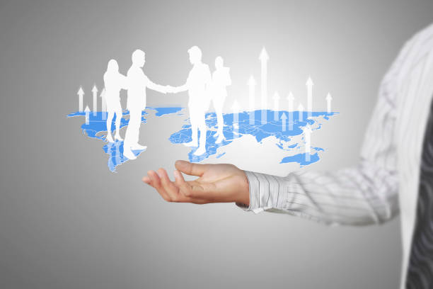 istock businessman with financial symbols coming 945536128