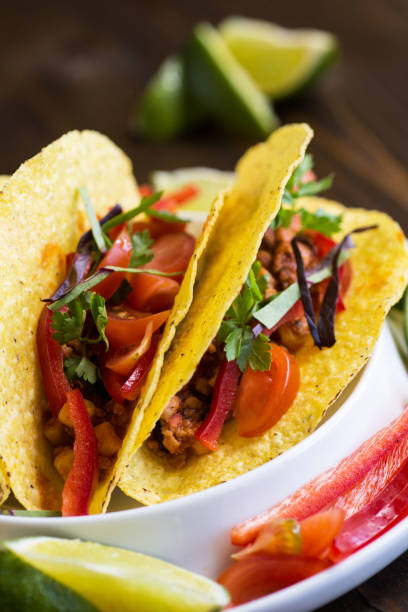 istock Colorful Mexican Tacos with Ground Beef and Vegetables 945543506