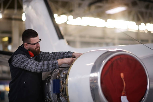 istock Aircraft mechanic in the hangar 945543520