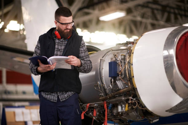 istock Aircraft mechanic in the hangar 945543714