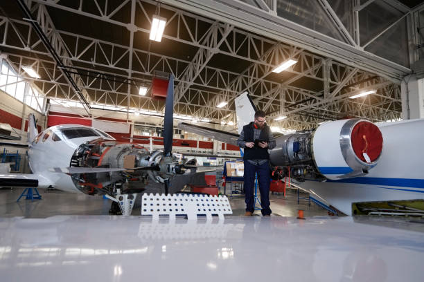 istock Aircraft mechanic in the hangar 945543966