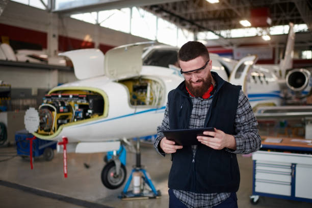 istock Aircraft mechanic in the hangar 945544816