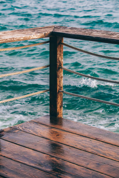 istock Fence from rope next to the sea 945545246