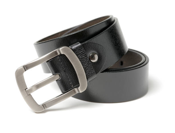 istock A black leather belt with chrome buckle on white background 945565502