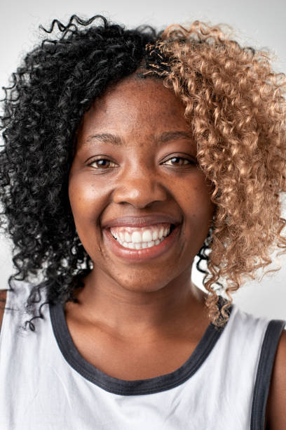 istock Studio portrait of African woman smiling 945570320