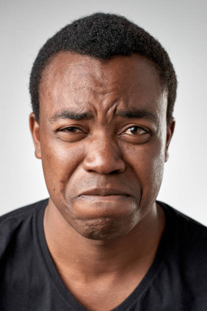 istock Studio portrait of African man making a silly expression 945573528