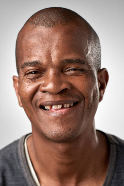 istock Studio portrait of happy African man smiling 945573562