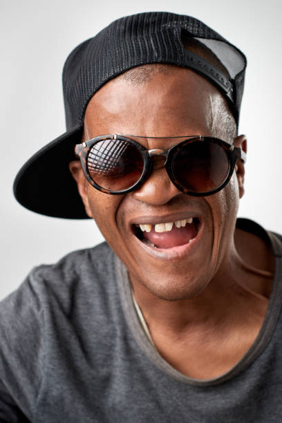 istock Studio portrait of African man having fun being silly 945573610