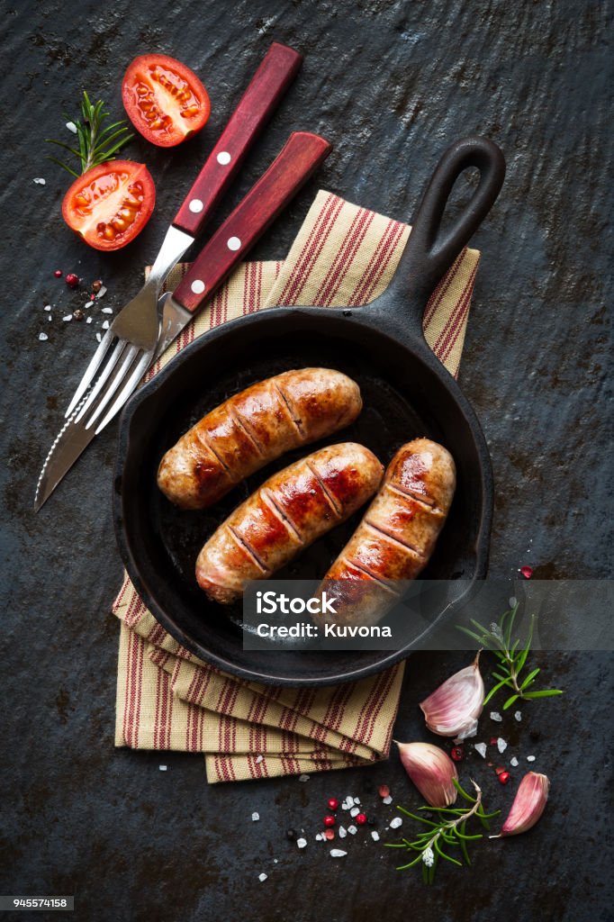 Grilled Sausages Or Bangers In A Vintage Skillet Stock Photo Download Image Now - Sausage, Grilled, Barbecue Grill - iStock
