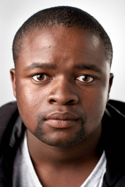 istock Studio portrait of African man no expression ID passport 945574496