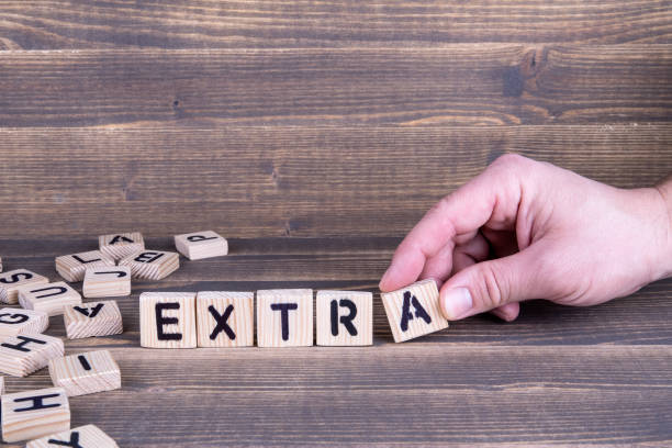 istock Extra. Wooden letters on the office desk 945574626