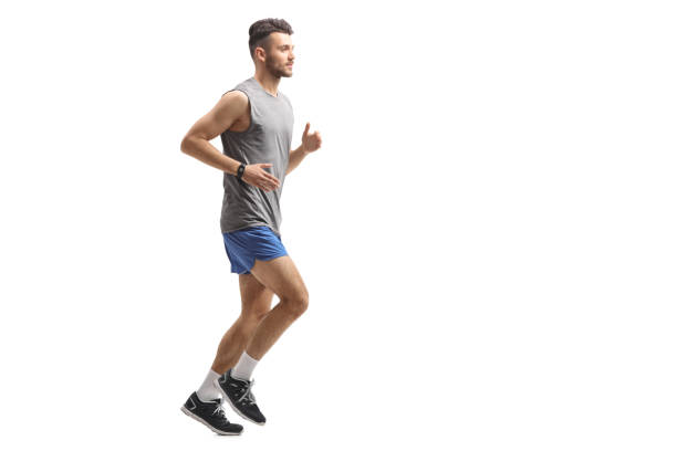 istock Young man in sportswear running 945577534