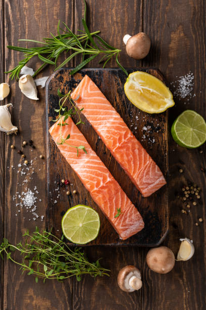 istock Fresh raw salmon fillet, flat lay 945577574