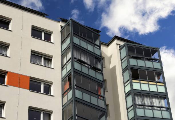 istock Apartment building with glazed balconies 945582008
