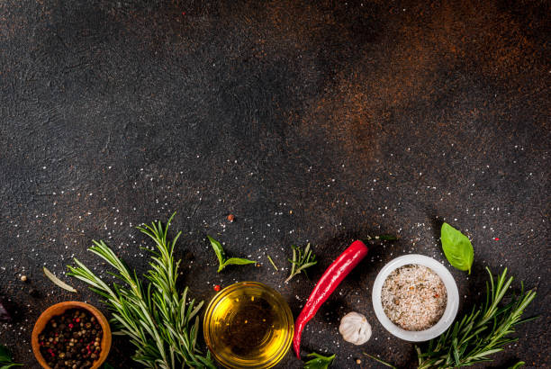 istock Cooking herbs and spices background 945588644