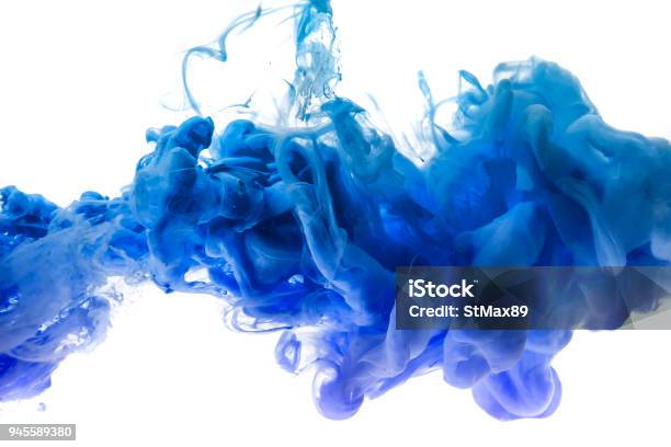 Blue Dye In Water On White Background Stock Photo - Download Image Now - Ink, Water, Blue