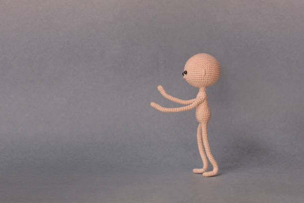 istock Mockup for presentation slide.A person stands sideways, pushes or holds object. 945603790