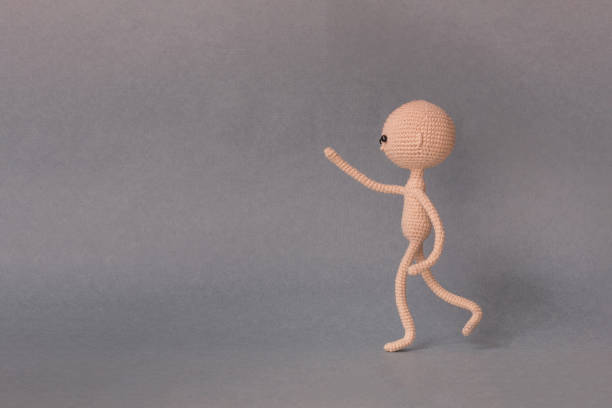 istock Mockup for presentation slide.A man runs and holds an object in his outstretched hand 945606108