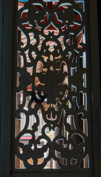 istock looking through wooden lattice window in a pagoda 945606642
