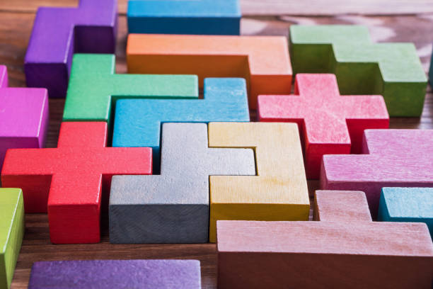 istock Geometric shapes on a wooden background. 945632038