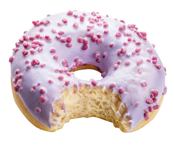 istock Purple sweet donut isolated with clipping path 945639866