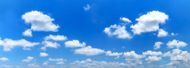 istock Panorama of blue sky and white clouds 945663154