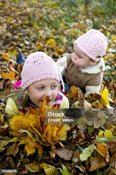 Sisters In A Park Stock Photo - Download Image Now - Activity, Autumn, Beautiful People