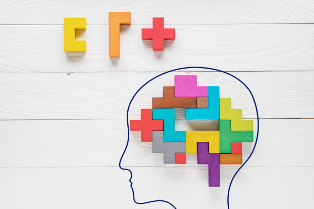 istock Human brain is made of multi-colored wooden blocks. 945667312