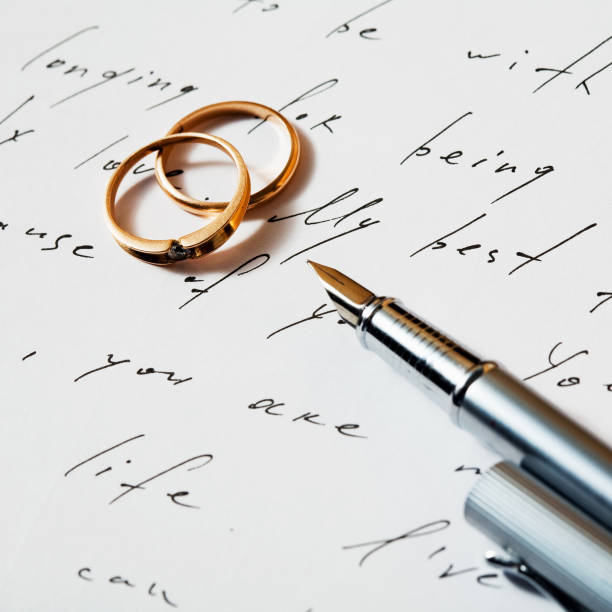 istock Golden rings and silver pen 94566839