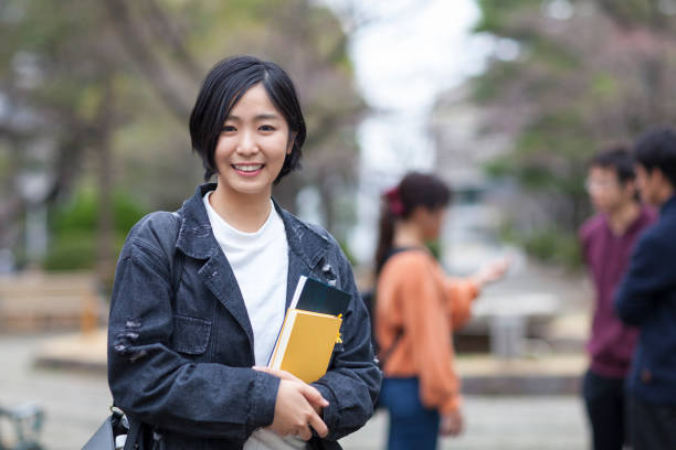istock Portrait of female university student 945672034