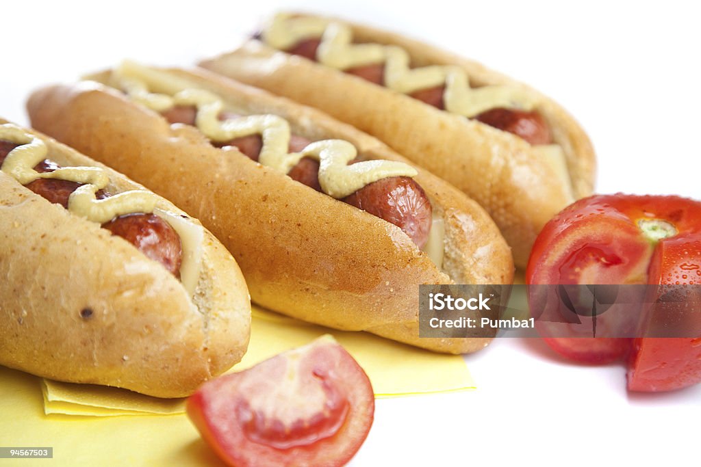 Drei hot dogs mit Tomaten - Lizenzfrei Amerikanischer Senf Stock-Foto