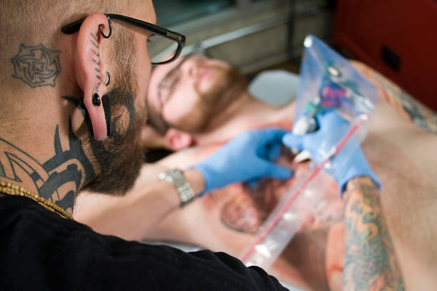 istock Tattooist Tattooing 94567783