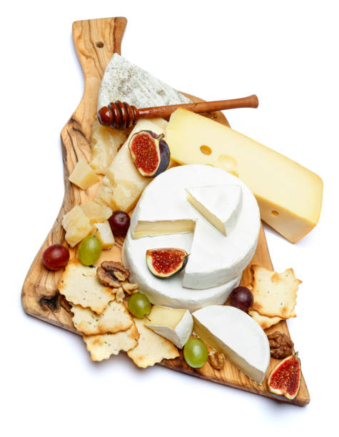 istock Brie cheese on a wooden Board with fresh figs and grapes 945681658