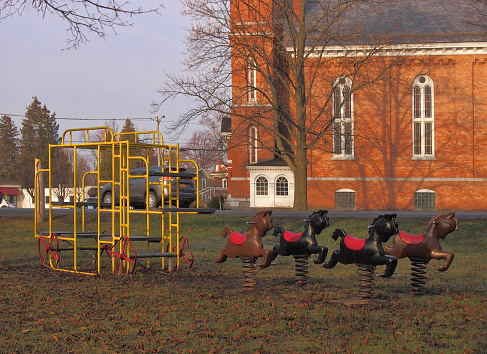 Old fashioned playground equipment in a small village park