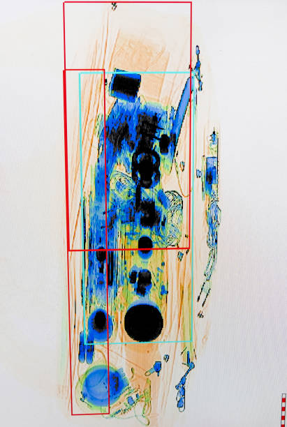 istock X-ray screenshot of an backpack filled with tele zoom camera and camcorder 945682108