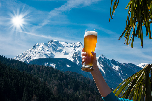 Wheat beer in mountain landscape