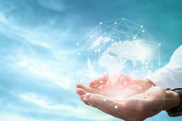 istock Businessman holding in hands with global connection concept. 945691286