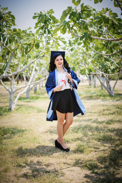istock Beautiful young girl graduated 945691516