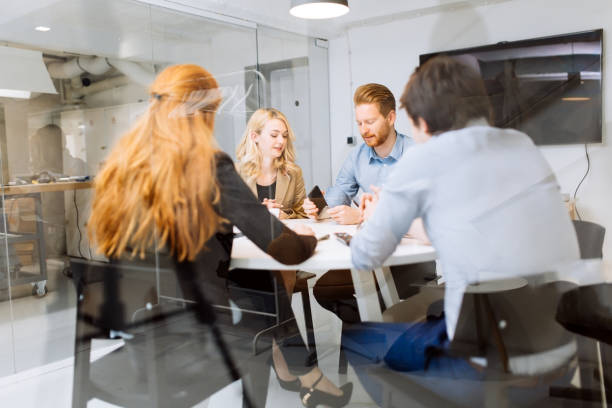 istock Business people board meeting in modern office 945692022