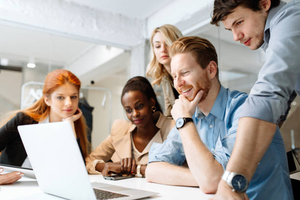 istock Group of business people working in office 945692352