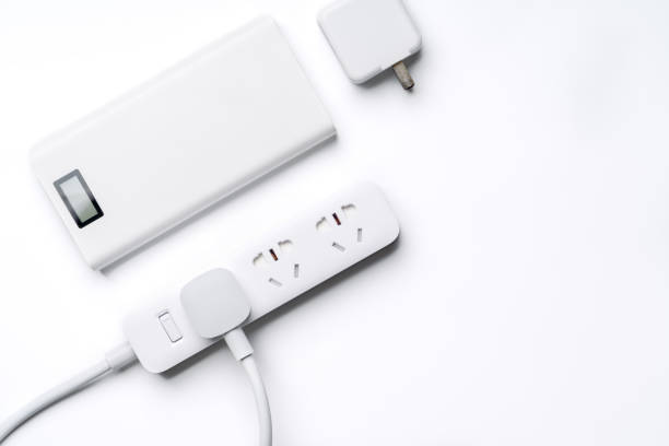 istock socket plug electric power bank and wire white color isolate. save energy and reduce energy efficiency concept 945692360