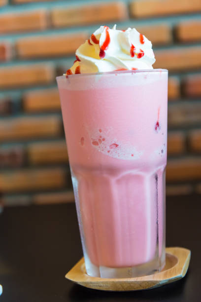 istock Ice Strawberry Smoothie on the wooden table. 945695166