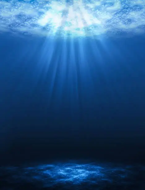 Sunbeam vertical Abstract underwater backgrounds in the sea.
